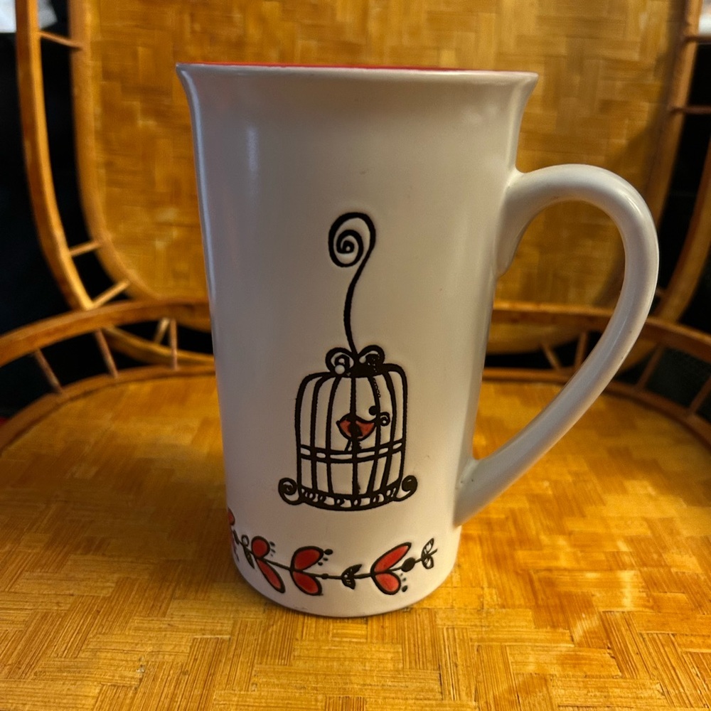 White Mug with Birdcage Design and Red Interior